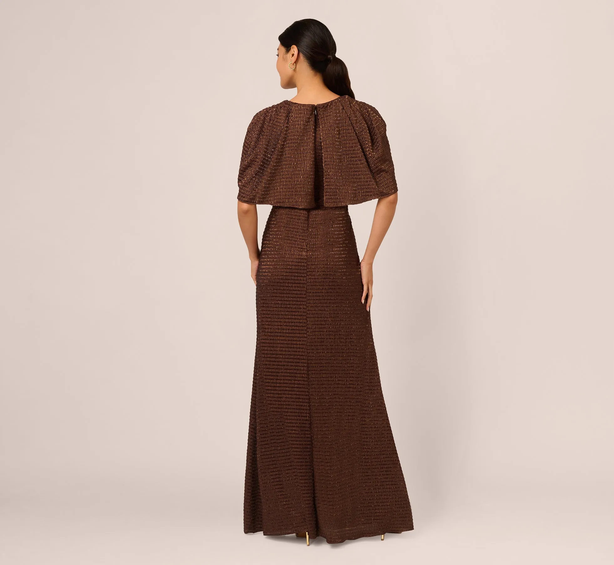 Pleated Metallic Cape Gown In Bronze